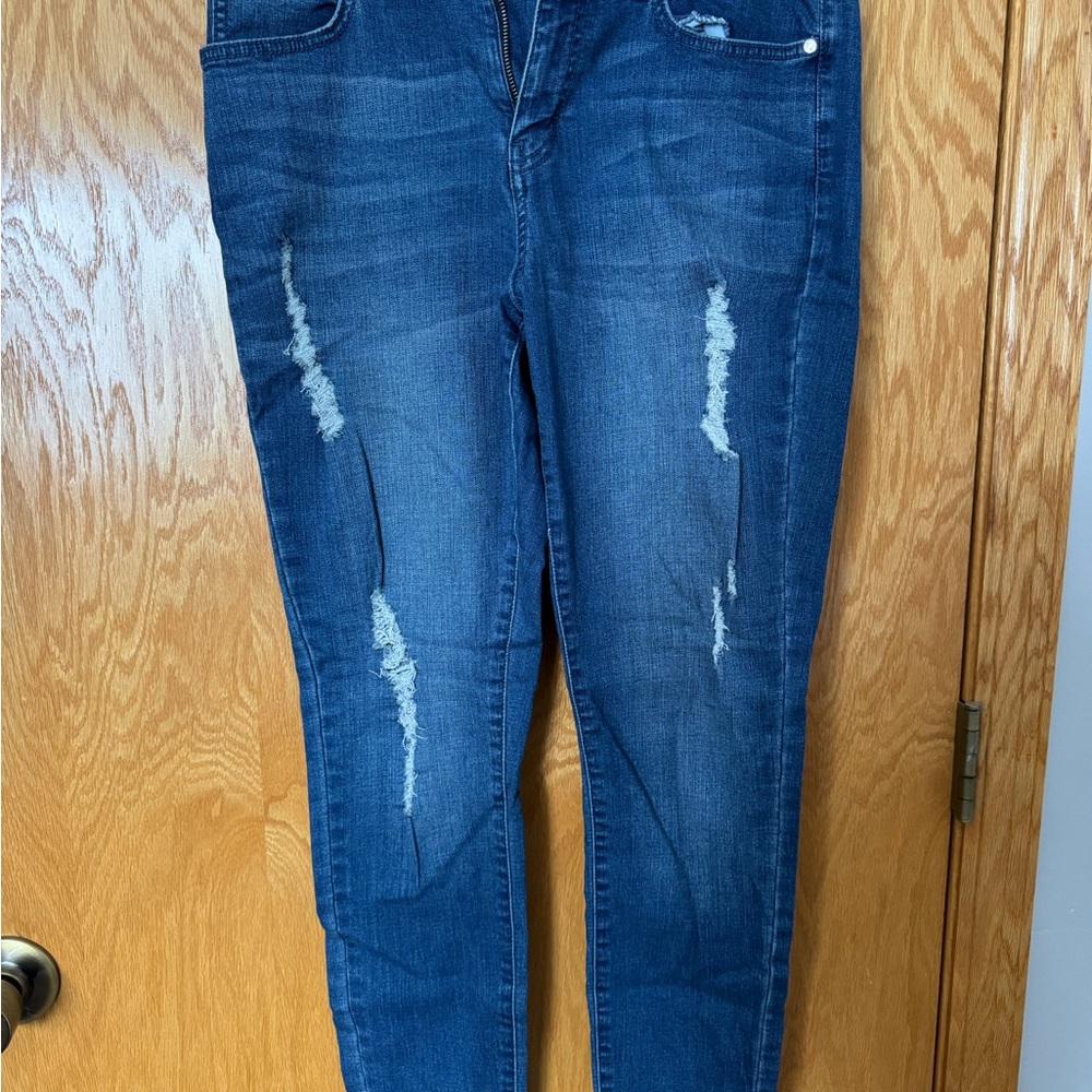 Jennifer Lopez Dark Blue Ripped Skinny Jeans